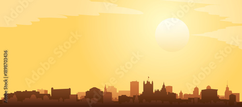 Golden yellow panoramic poster of the city skyline with misty background buildings and clouds of LONDON, ENGLAND