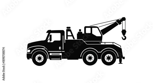 A stark black silhouette depicts a heavy duty tow truck with an extended crane arm and hook silhouette high quality professional