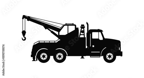 A stark black silhouette depicts a heavy duty tow truck with a raised boom and hook showcasing roadside assistance capabilities silhouette