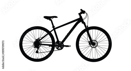 A detailed black silhouette of a mountain bike with visible gears wheels and frame presenting a stark visual contrast silhouette