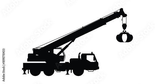 A stark black silhouette depicts a mobile crane with an extended boom and attached rigging showcasing industrial power and function silhouette