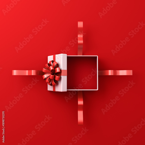 Foto Blank white gift box open or top view of white present box tied with red ribbon