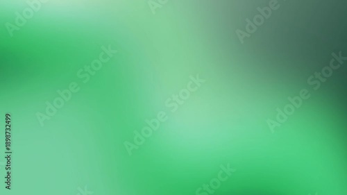 Abstract green background with soft gradient and light effects.