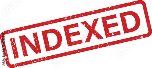 Distressed red rubber stamp with the word INDEXED diagonally placed on a clean white surface