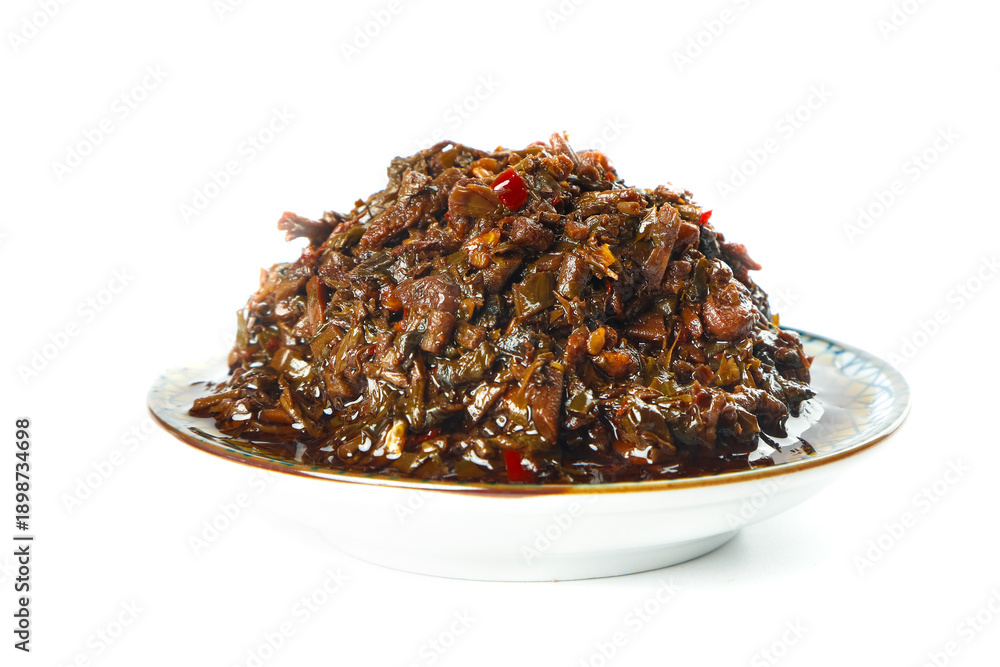Obraz premium Yunnan Spicy Stewed Chili Dish on White Plate