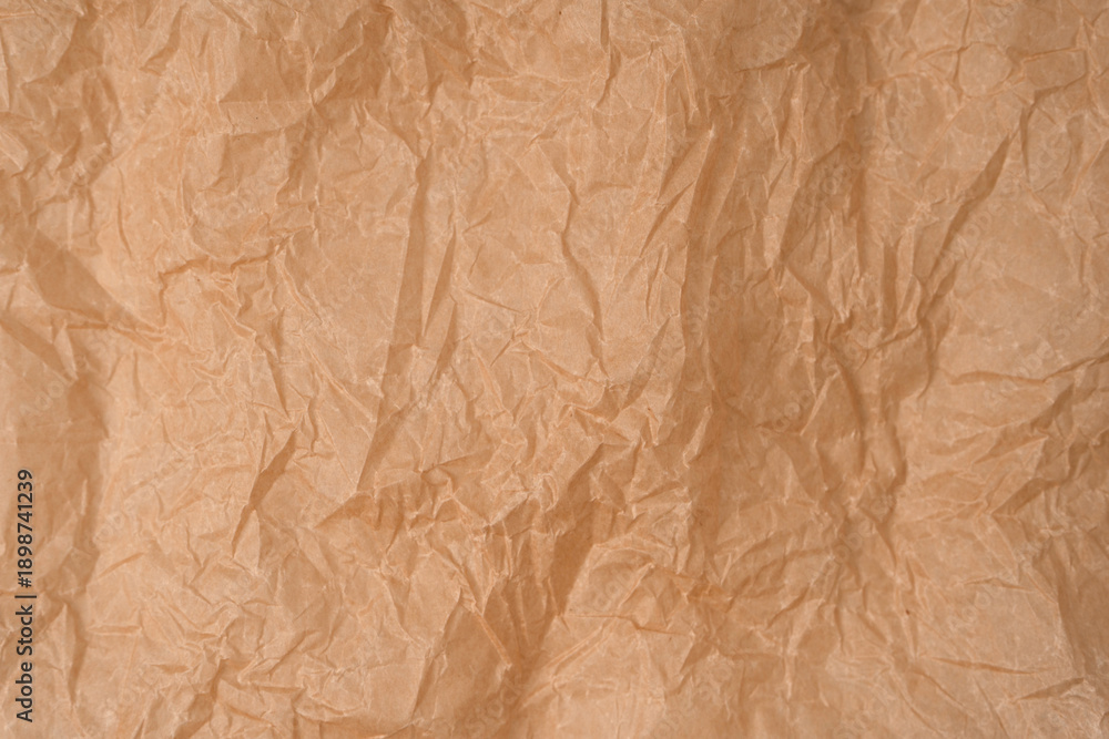 Fototapeta premium Crumpled paper as background. Top view.