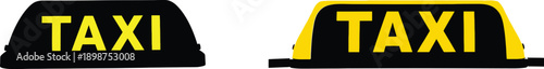 Two yellow and black taxi signs displayed side by side