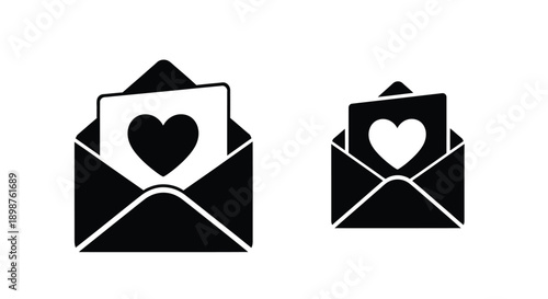 Two black silhouettes of envelopes with heart shapes inside