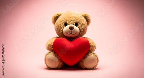 Light brown teddy bear holding a red heart against a pink background plush toy desig