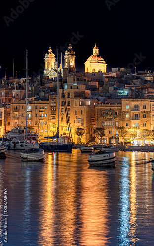 Silhouette and night reflections of the Valletta.Malta