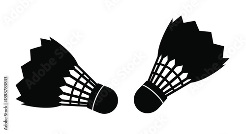 Two black badminton shuttlecocks depicted in a simple graphic style