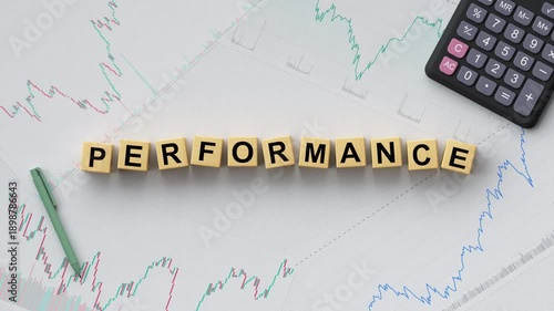 The word Performance is spelled out using wooden letter blocks over financial charts. Representing business success, growth, evaluation, and financial data analysis. 3D render animation