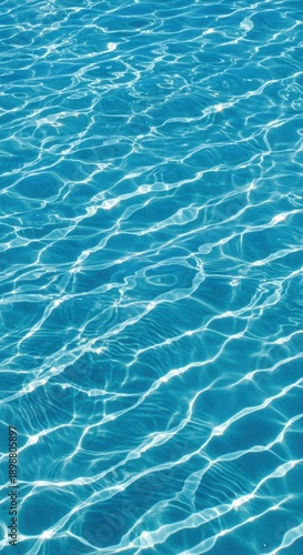 Abstract blue water texture background featuring dynamic patterns of subtle wind ripples. Bright sunlight reflects and shimmers across the clear liquid surface, natural, pool, liquid