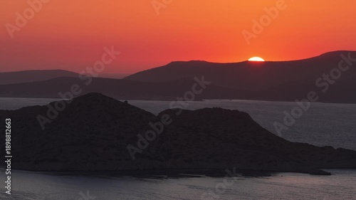 Wallpaper Mural Sun setting over Rodos Greece mountains and tranquil sea Torontodigital.ca