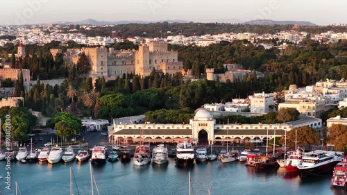 Wallpaper Mural Rodos harbor boats and Mandraki architecture at golden hour Torontodigital.ca