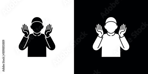 Two silhouettes of a person in prayer contrasting black and white