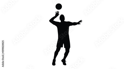 Silhouette of a person tossing a ball upwards in a dynamic pose
