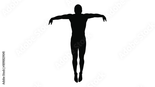 Silhouette of a person with arms outstretched appearing to float or dive