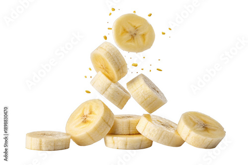 sliced bananas falling mid-air isolated on a transparent background.