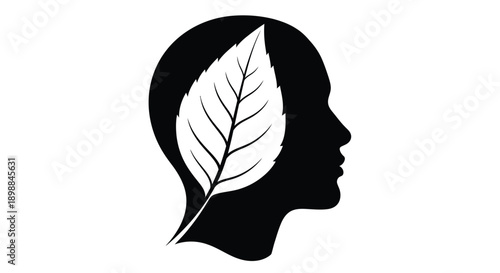 Silhouette of a human head with a leaf filling the brain space