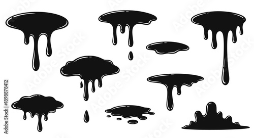 Black ink splatters and drips on white background