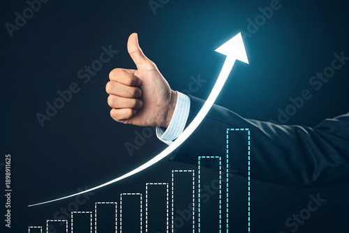 Businessman giving thumbs up with growing graph and upward arrow