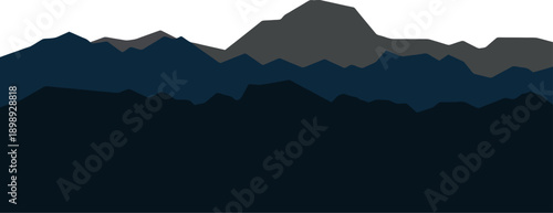 A serene mountain range at dusk with varying shades of blue and grey peaks