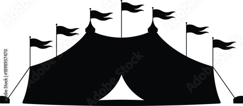 Black silhouette of a circus tent with ornate peaks and flags on poles against a white background signifying a grand entertainment spectacle