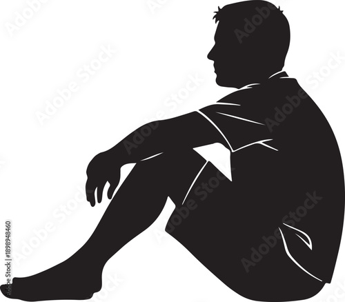 Silhouette of a man sitting outdoors with his legs extended, looking thoughtful and pensive.