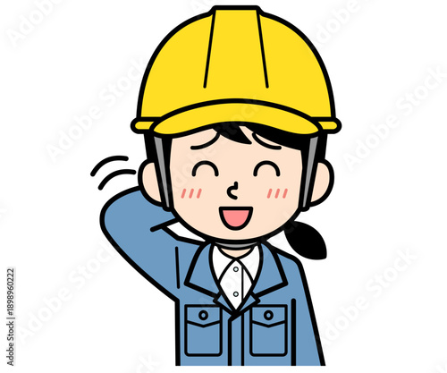 照れているヘルメットをかぶった現場監督の女性