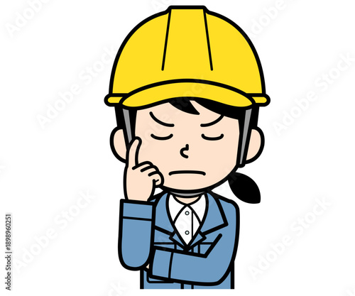 熟考するヘルメットをかぶった現場監督の女性