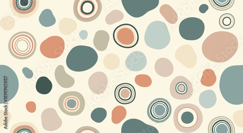 Seamless pattern of various abstract organic shapes and concentric circles in muted pastel earthy tones for a modern look.