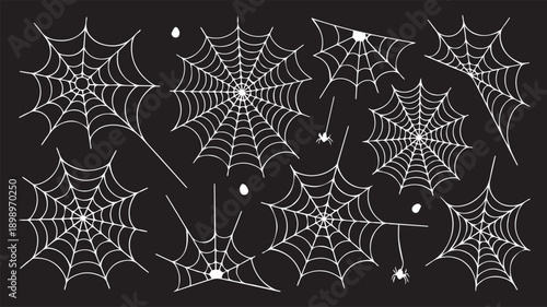 Set of diverse spider web designs and creepy spiders for Halloween decoration