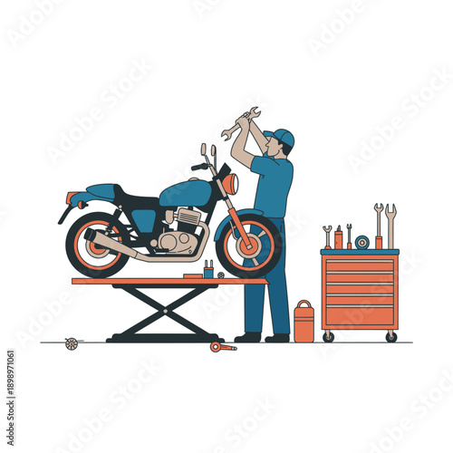Mechanic repairing motorcycle in workshop
