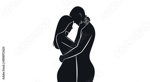 Silhouetted couple embracing in a tender intimate moment of affection
