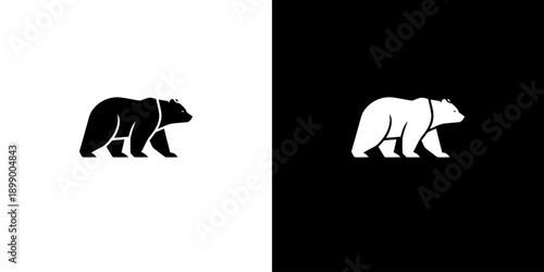 Graphic illustration of black and white bear silhouettes on split background