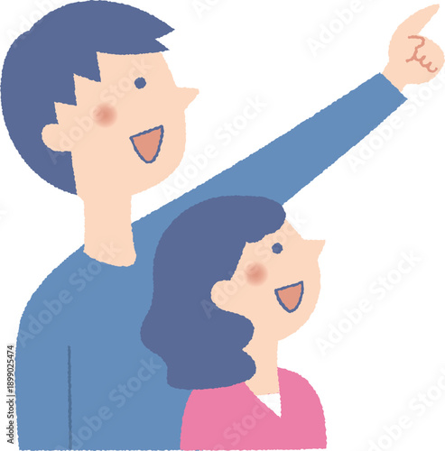 指を指して見上げる男女