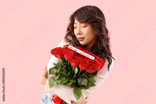 Beautiful young Asian woman...
