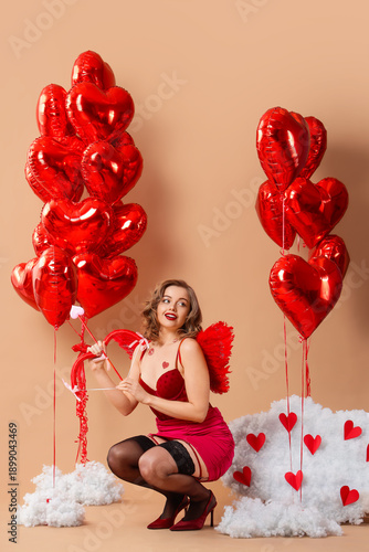 Sexy young woman dressed as...