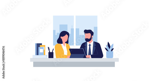 Man and woman working together on laptop.