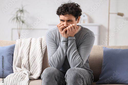 Young man having panic atta...