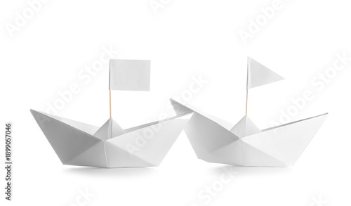 Origami boats with flags on...