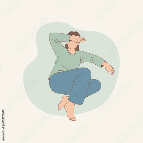 Woman covering face with hand in a relaxed pose.