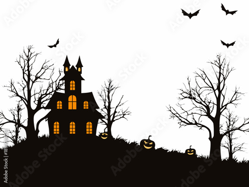 A spooky silhouette of a haunted house with bats and pumpkins