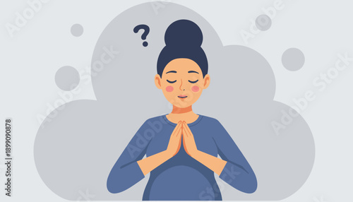 Young woman meditating with hands in prayer pose and calm expression  