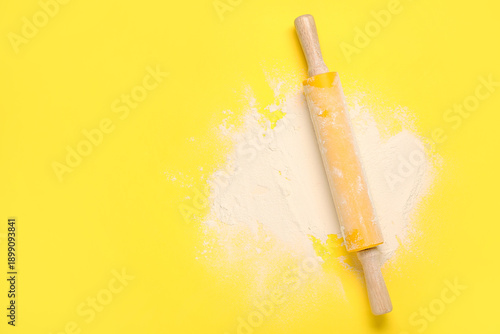 Rolling pin and flour on ye...