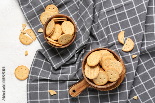 Bowls with tasty crackers o...