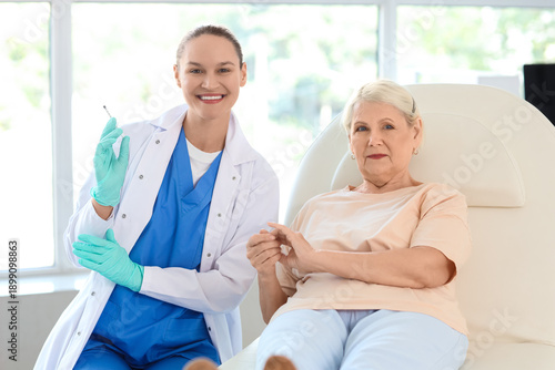 Senior woman with doctor va...