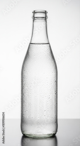 Wallpaper Mural Sparkling lemonade in a clear glass bottle isolated against a pristine white background, showcasing condensation droplets and minimalist design Torontodigital.ca