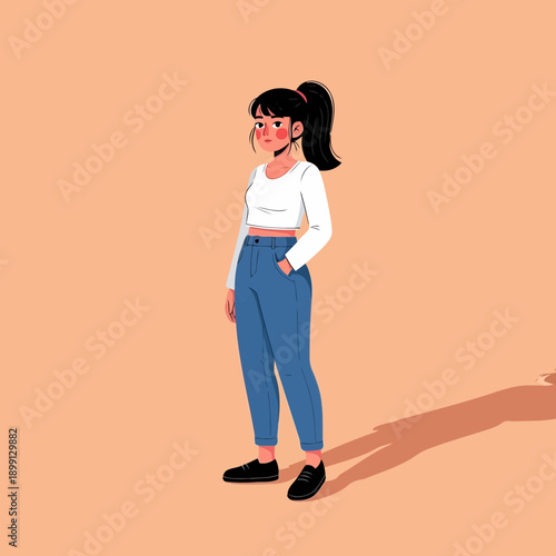A young woman standing alone on a peach background looking sideways